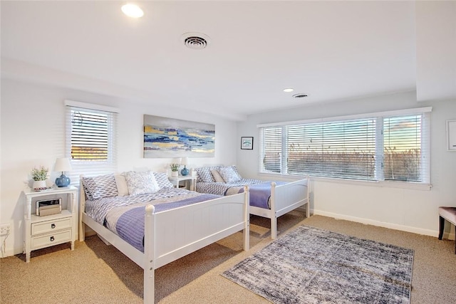 bedroom with multiple windows