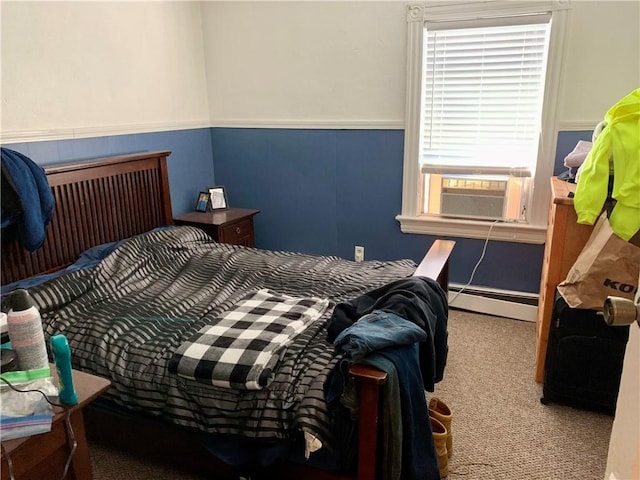 bedroom featuring light carpet, cooling unit, and baseboard heating