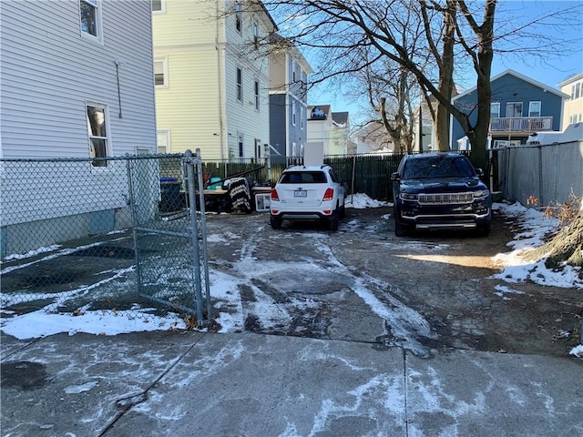 view of snow covered parking