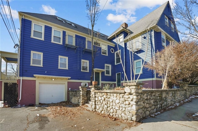 view of front of home with a garage