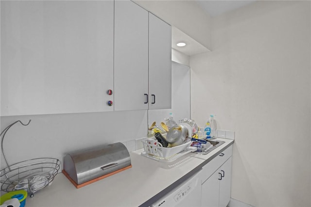 kitchen featuring white cabinets