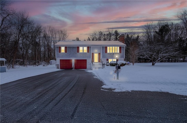 view of front of property featuring a garage