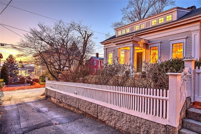 view of property exterior at dusk