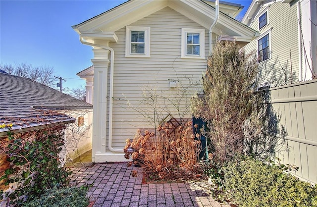 view of side of home featuring a patio