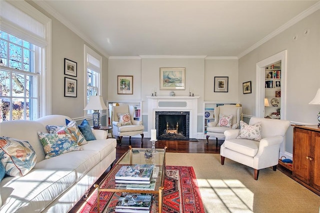 living room featuring crown molding and hardwood / wood-style flooring