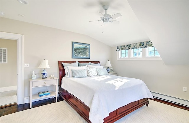 bedroom featuring dark hardwood / wood-style flooring, vaulted ceiling, a baseboard radiator, and ceiling fan