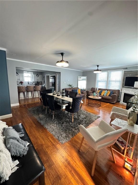 living room with hardwood / wood-style flooring and a healthy amount of sunlight