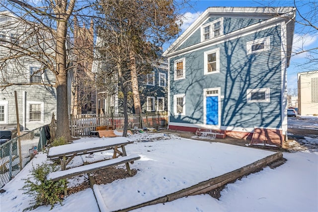 view of snow covered property