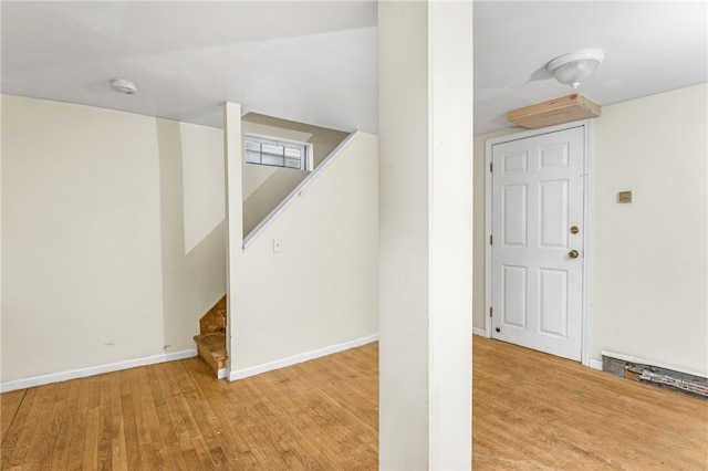 interior space with hardwood / wood-style floors