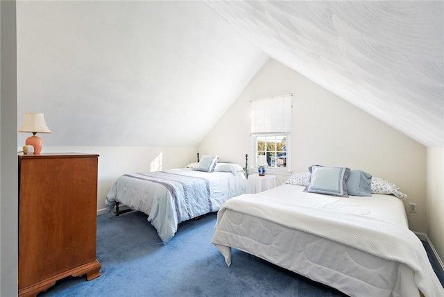 carpeted bedroom featuring vaulted ceiling