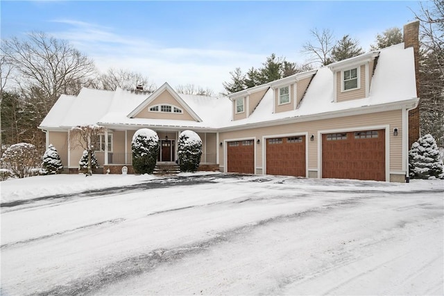 view of front of property with a garage