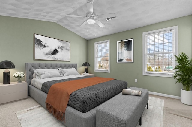 carpeted bedroom with lofted ceiling and ceiling fan