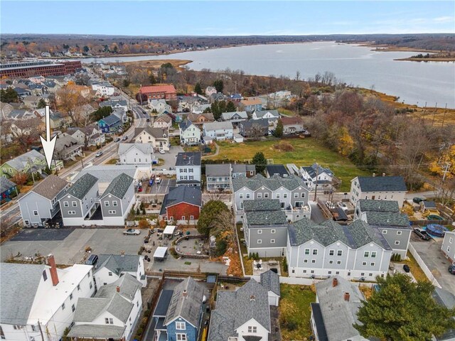 bird's eye view featuring a residential view and a water view