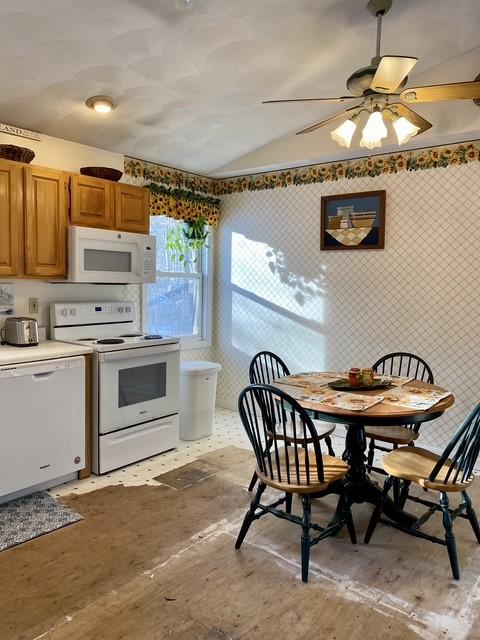 kitchen featuring ceiling fan and white appliances