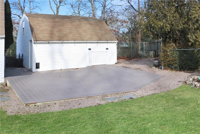 garage featuring a lawn