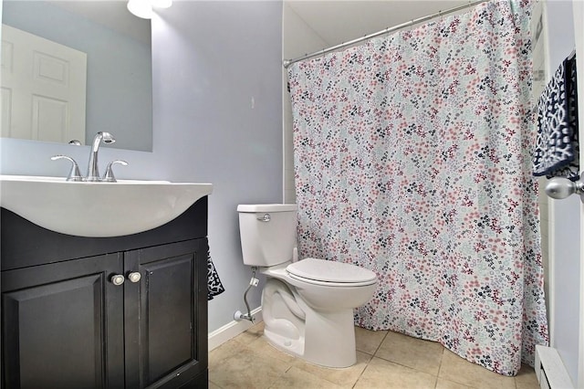 bathroom featuring vanity, a baseboard heating unit, tile patterned floors, and toilet