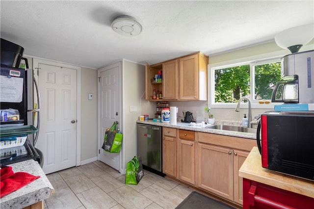 kitchen with sink, light tile patterned floors, dishwasher, range, and decorative backsplash