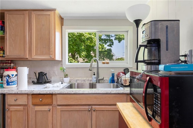 kitchen with tasteful backsplash and sink