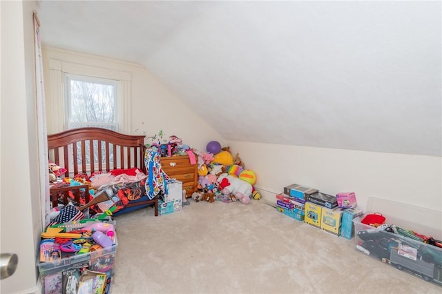 carpeted bedroom with vaulted ceiling