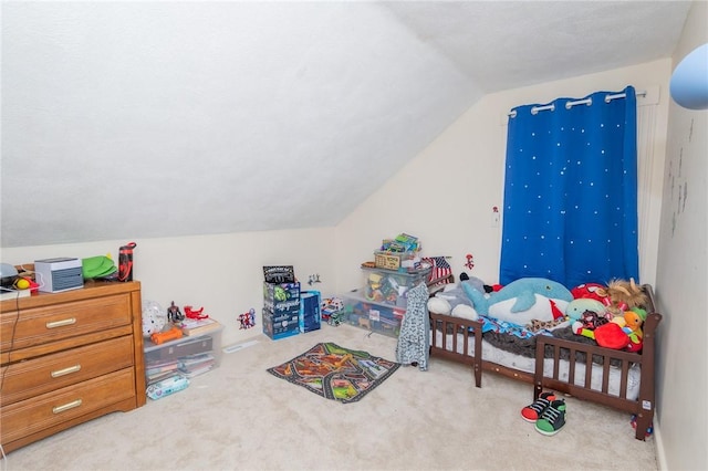 carpeted bedroom featuring vaulted ceiling