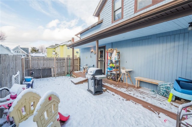 view of yard covered in snow