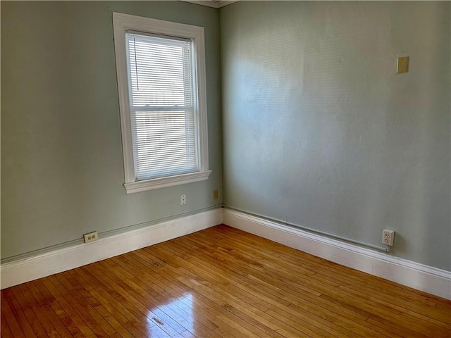 unfurnished room featuring light hardwood / wood-style flooring