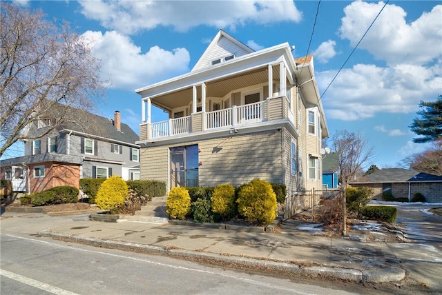 view of front of home with a balcony