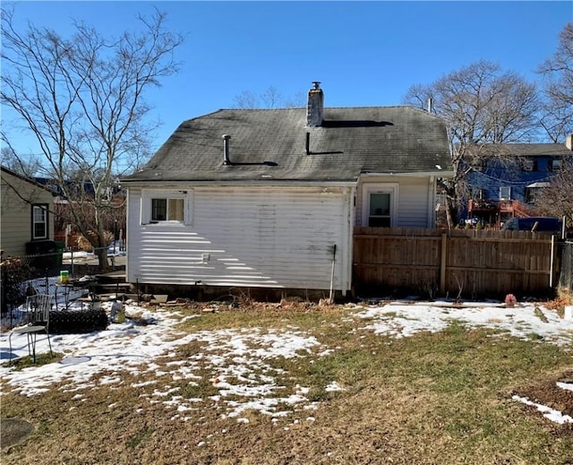 view of snow covered house