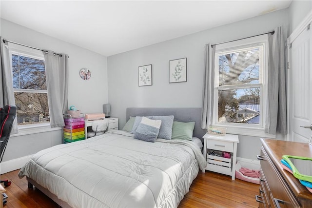 bedroom with light hardwood / wood-style flooring