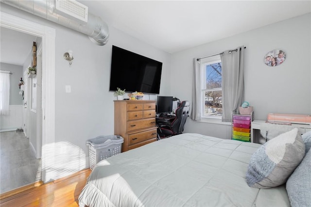 bedroom featuring hardwood / wood-style flooring