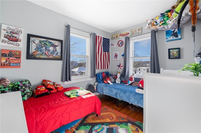 bedroom with wood-type flooring