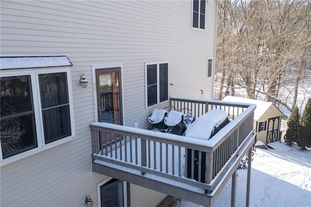 view of snow covered deck