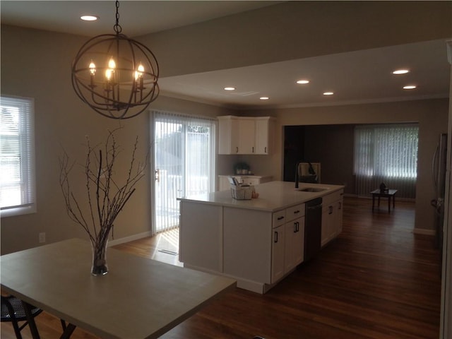 kitchen featuring white cabinetry, hanging light fixtures, dark hardwood / wood-style floors, black dishwasher, and a center island with sink