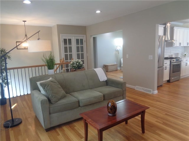 living room with light wood-type flooring