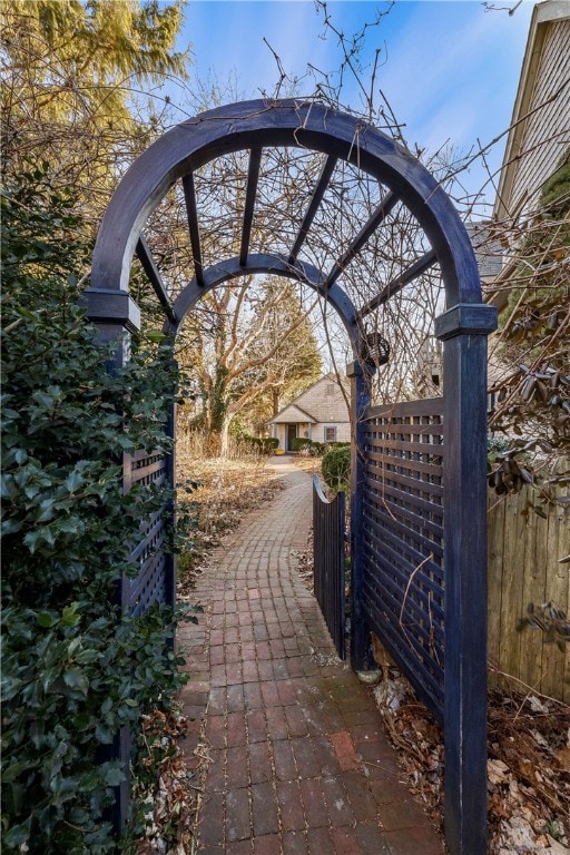 view of property's community with fence