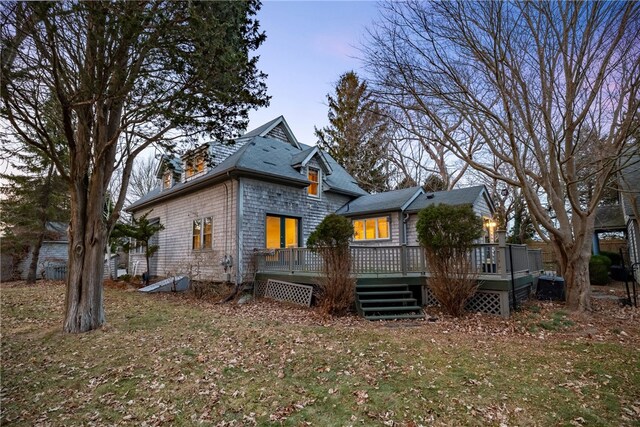 exterior space featuring a yard and a deck