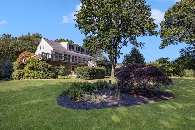 view of yard featuring a deck