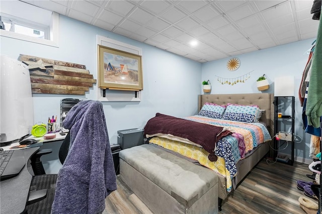 bedroom with wood-type flooring