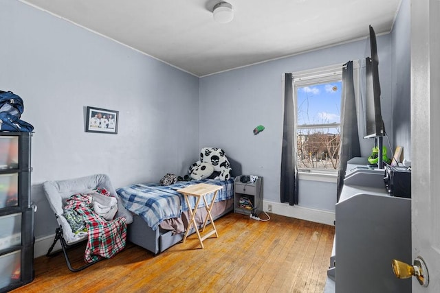 bedroom with light hardwood / wood-style flooring