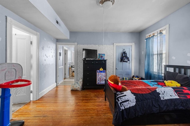 bedroom featuring hardwood / wood-style floors