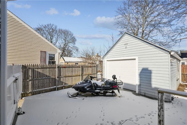 exterior space featuring a garage and an outdoor structure