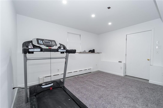 workout room featuring a baseboard radiator and carpet floors