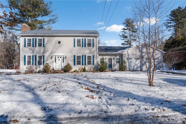 colonial house featuring a garage