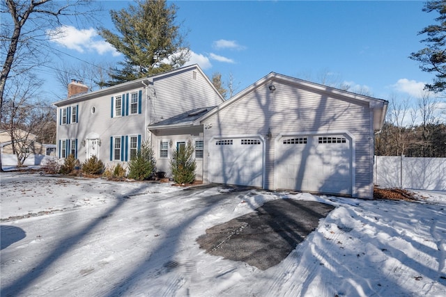 view of front of property with a garage