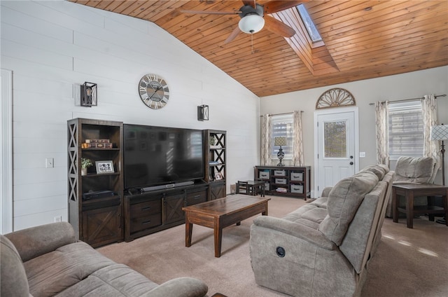 living room with a wealth of natural light, light carpet, wooden ceiling, and ceiling fan