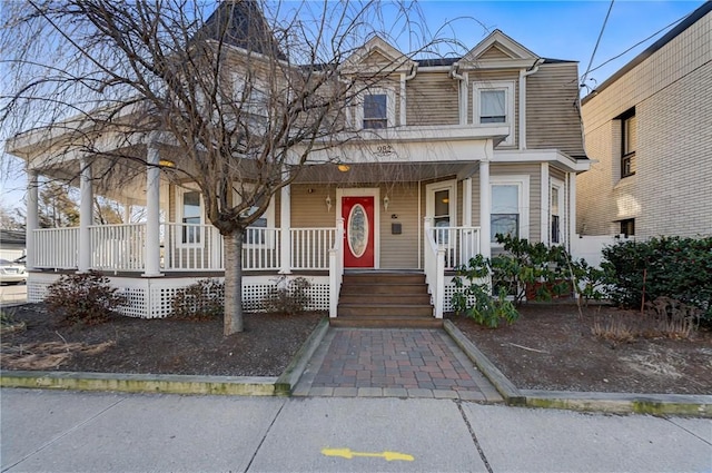 view of property with a porch