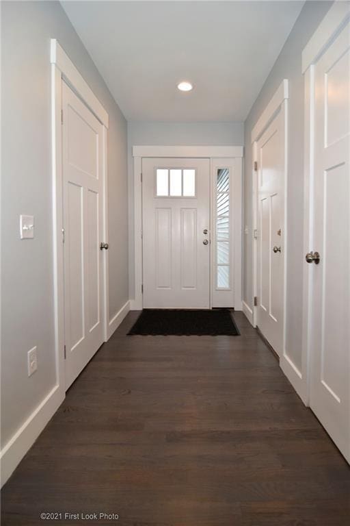 doorway featuring dark hardwood / wood-style flooring