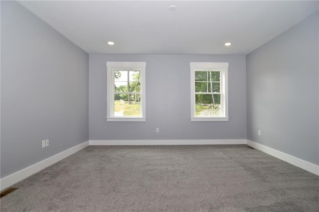 view of carpeted spare room