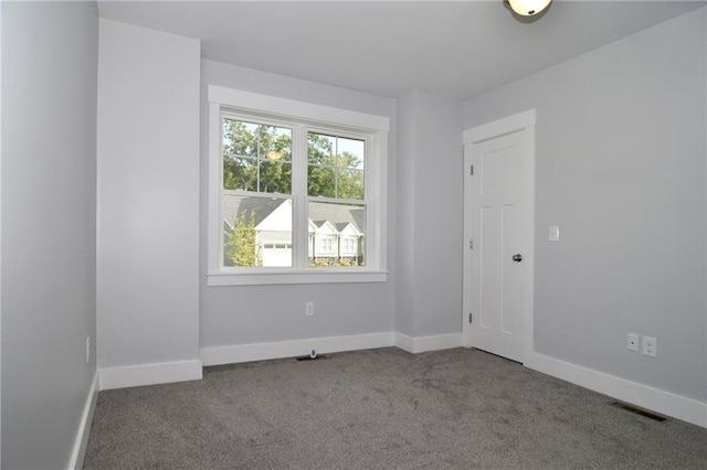 view of carpeted spare room