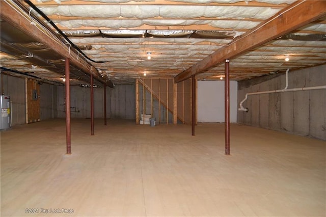 basement featuring electric water heater